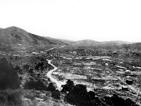 Manhattan gulch between Mount Moriah and Wolf Tone Point,  Manhattan gulch between Mount Moriah and Wolf Tone Point, showing placer workings. Nye County, Nevada. 1915. Plate 17-A in U.S. Geological Survey. Bulletin 723. 1924.
